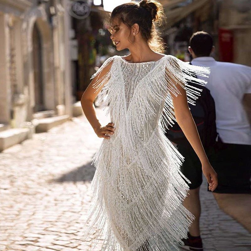 Сукні на Новий рік 2023: фото-новинки для жінок та дівчат